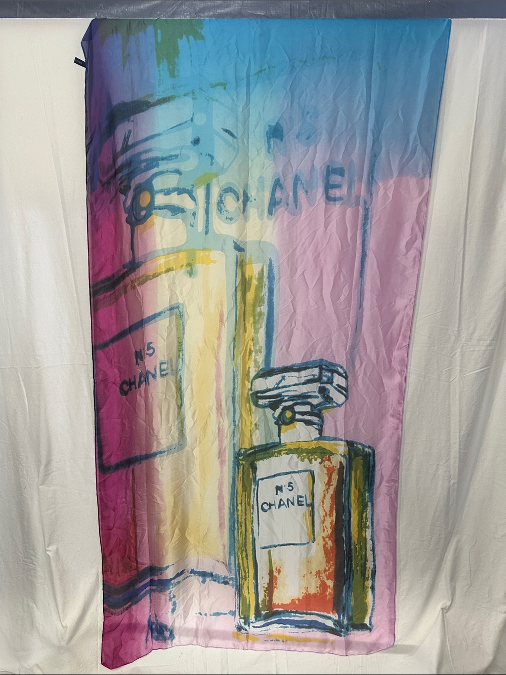 100% Silk Scarf with the N•5 Chanel Perfume design on it.